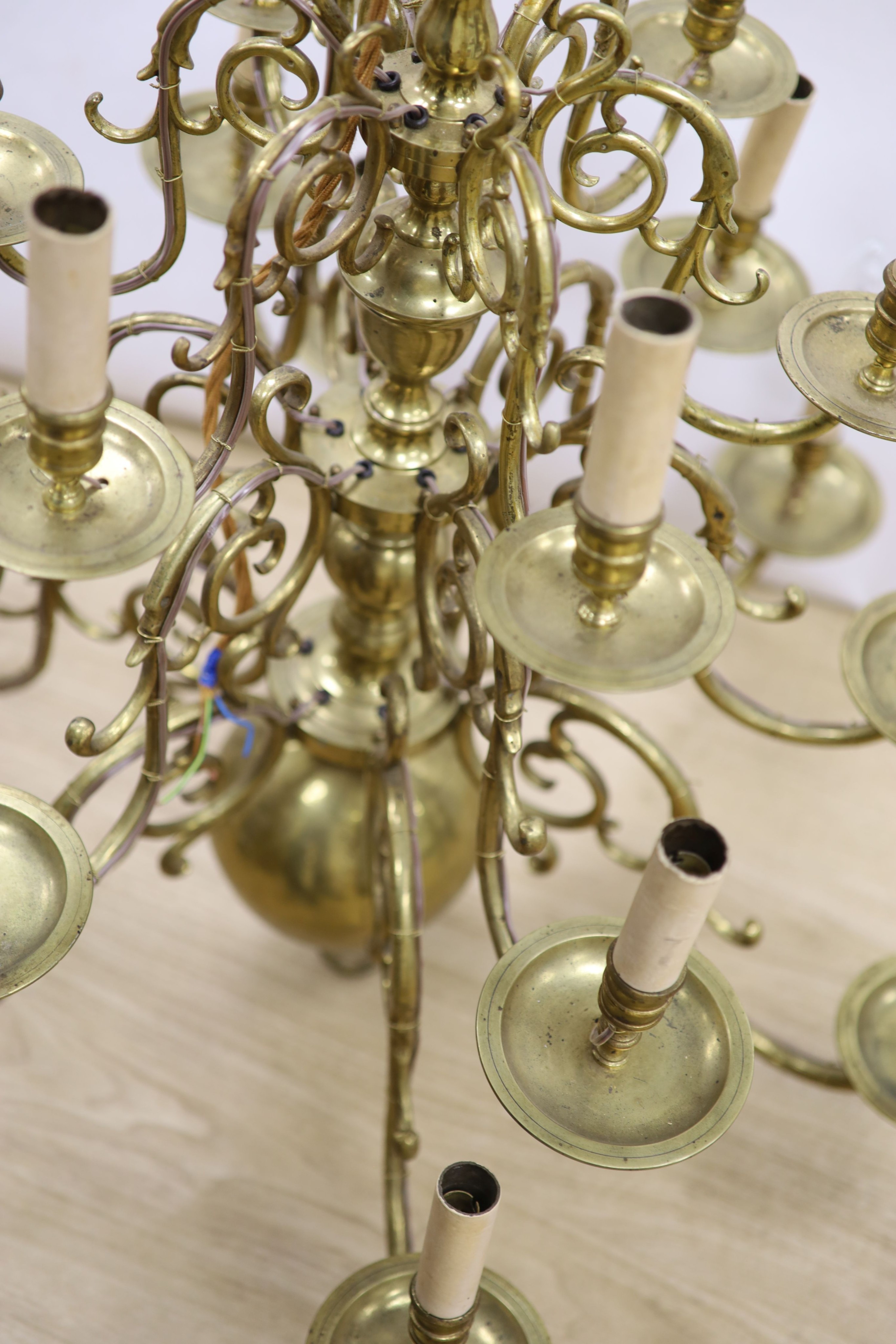 A 19th century Dutch brass chandelier, 84 cm high